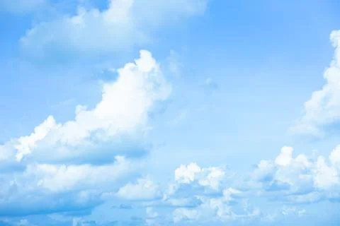 White clouds with blue sky Background On a bright day with copy space for tex Foto stock