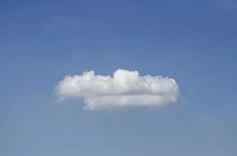 White clouds in the blue sky background and texture. Stock Photos