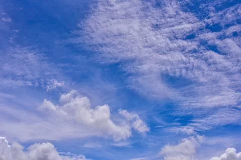 White clouds on blue sky background. Stock Photos