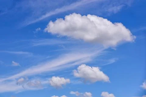 White clouds on blue sky background. Stock Photos