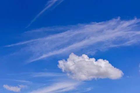 White clouds on blue sky background. Stock Photos
