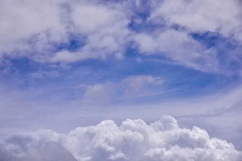 White clouds on blue sky background. Stock Photos