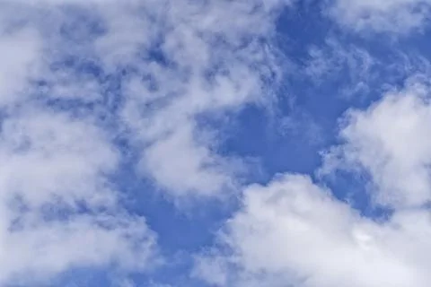 White clouds in the blue sky background Stock Photos