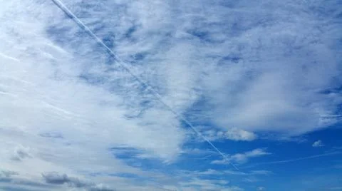 White clouds on the blue sky background. Panoramic photo Stock Photos