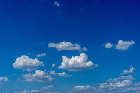 White clouds in the blue sky background Stock Photos
