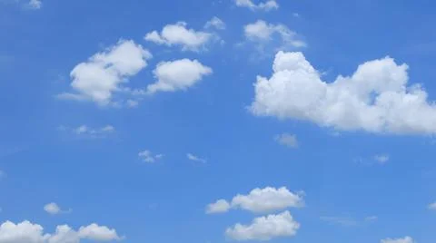 White clouds on blue sky background Stock Photos