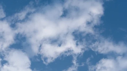White clouds at the blue sky (bottom view) Stockbeeldmateriaal 118156029