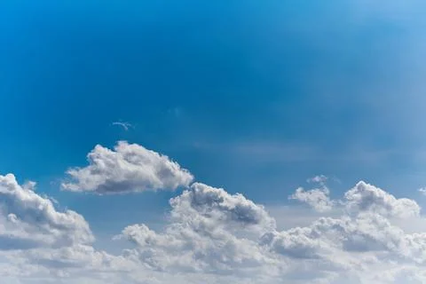 White clouds in the blue sky, close-up of clouds in the blue sky, light on th Foto stock