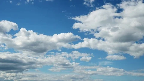White clouds in the blue sky. Cloudscape motion freedom. Energy clouds timelapse Stock Footage 77577884