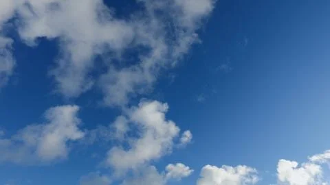 White clouds on a blue sky in cold winter day Stock Photos