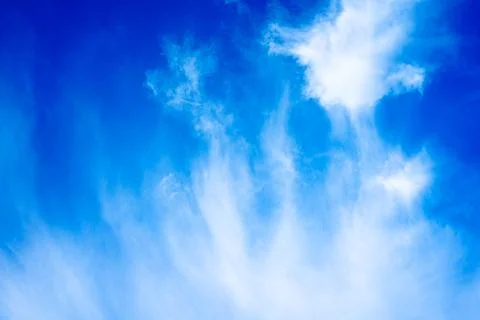White clouds on blue sky with copy space for banner or wallpaper background.  Stock Photos