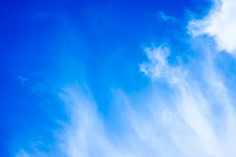 White clouds on blue sky with copy space for banner or wallpaper background.  Stock-Fotos