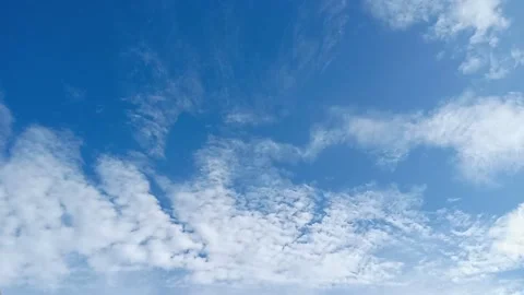 White clouds on a blue sky during the day Stock Footage 221755118