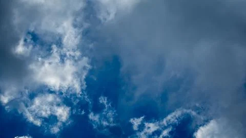 White clouds on a blue sky during the day Stock Photos