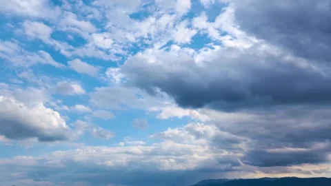 White Clouds in a Blue Sky Stock Footage 292208925