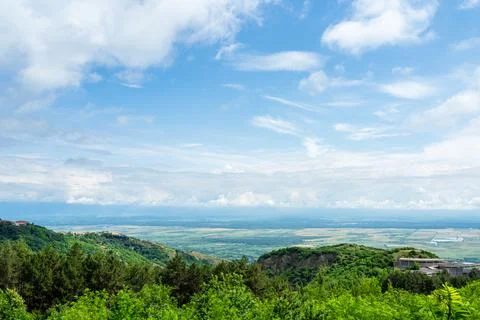 White clouds in blue sky over Alazani valley Stock Photos