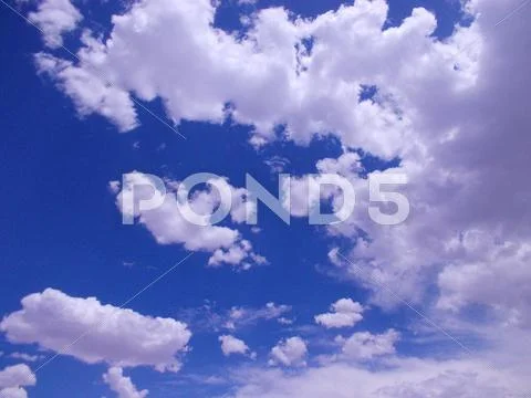 White Clouds in the Blue Sky Stock Photos