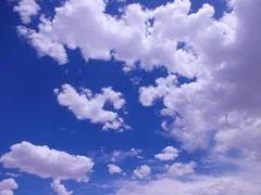 White Clouds in the Blue Sky Stock Photos