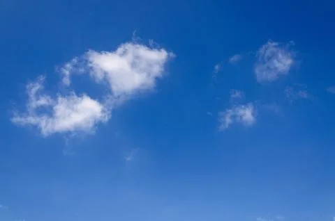 White clouds in blue sky Stock Photos