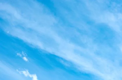 White clouds on the blue sky Stock Photos