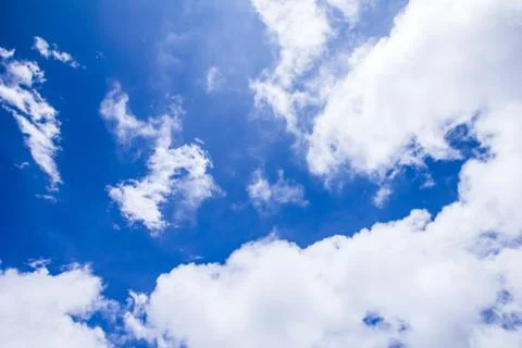 White clouds in blue sky Stock Photos