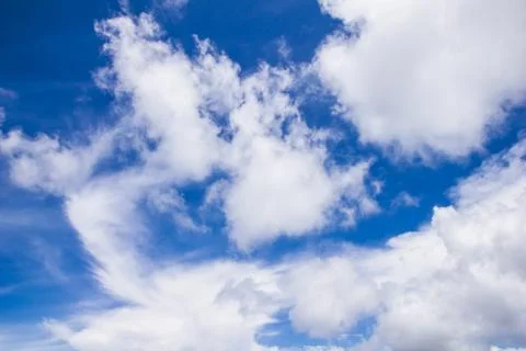 White clouds in blue sky Stock Photos