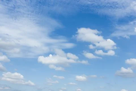 White clouds in the blue sky Stock Photos
