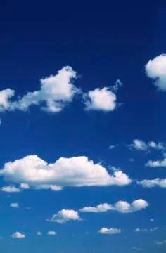 White Clouds, Blue Sky Stock Photos
