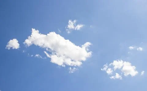 White clouds in the blue sky Stock Photos