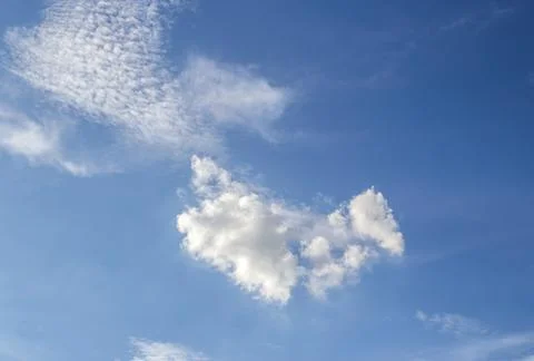 White clouds in the blue sky Stock Photos