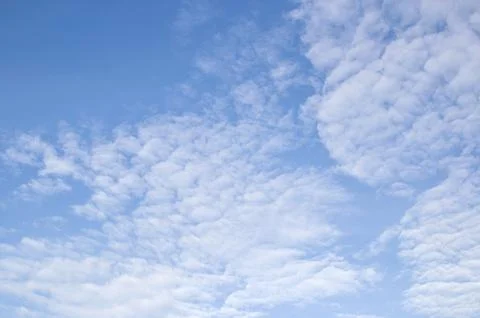 White clouds in the blue sky Stock Photos