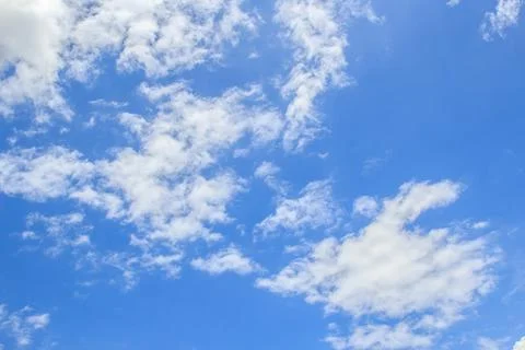 White clouds in the blue sky Stock Photos