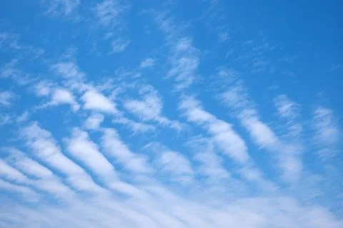White clouds in the blue sky Stock Photos