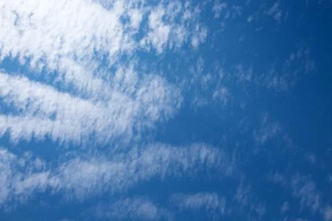 White clouds in the blue sky Stock Photos