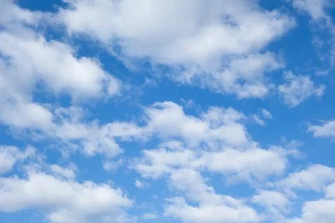 White clouds on a blue sky Stock Photos