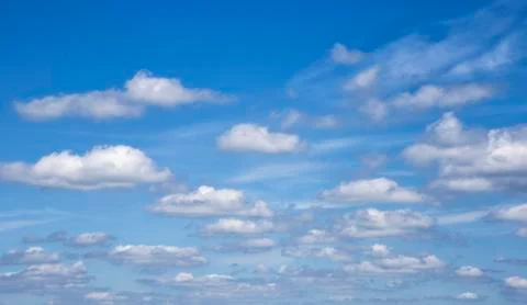 White clouds in the blue sky Stock Photos
