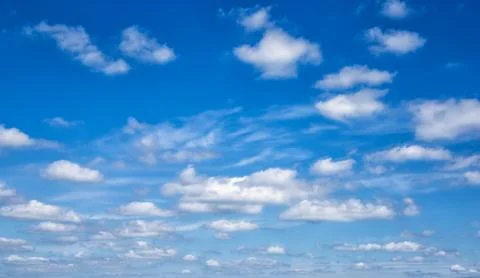 White clouds in the blue sky Stock Photos