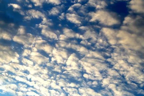 White clouds on a blue sky Stock Photos