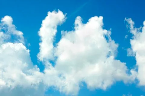 White clouds on a blue sky Stock Photos