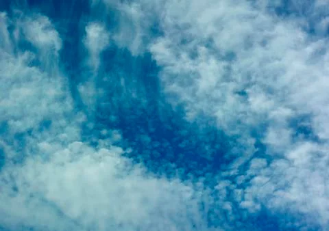 White clouds on a blue sky Stock Photos