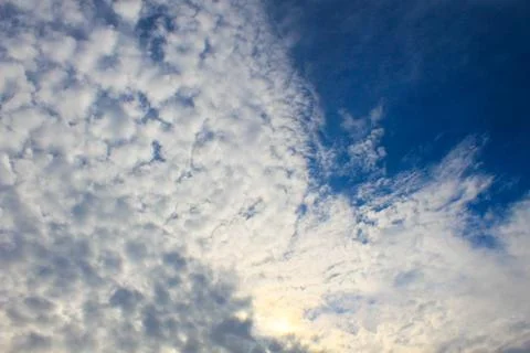 White clouds in the blue sky Stock Photos