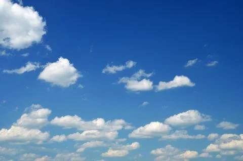 White clouds in the blue sky Stock Photos