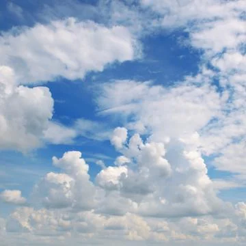 White clouds in blue sky Stock Photos