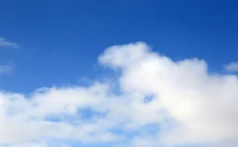 White clouds in blue sky Stock Photos