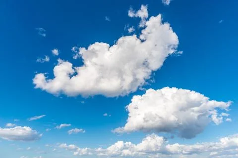 White clouds in blue sky Stock Photos