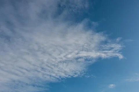 White clouds in the blue sky Stock Photos