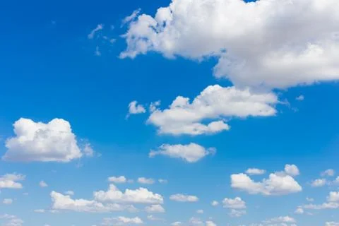 White clouds in the blue sky Stock Photos