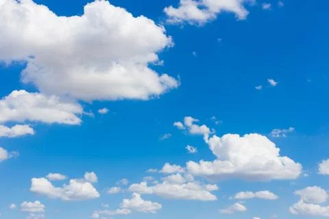 White clouds in the blue sky Stock Photos