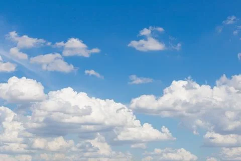 White clouds in the blue sky Stock Photos