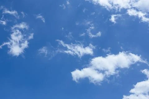 White clouds in the blue sky Stock Photos